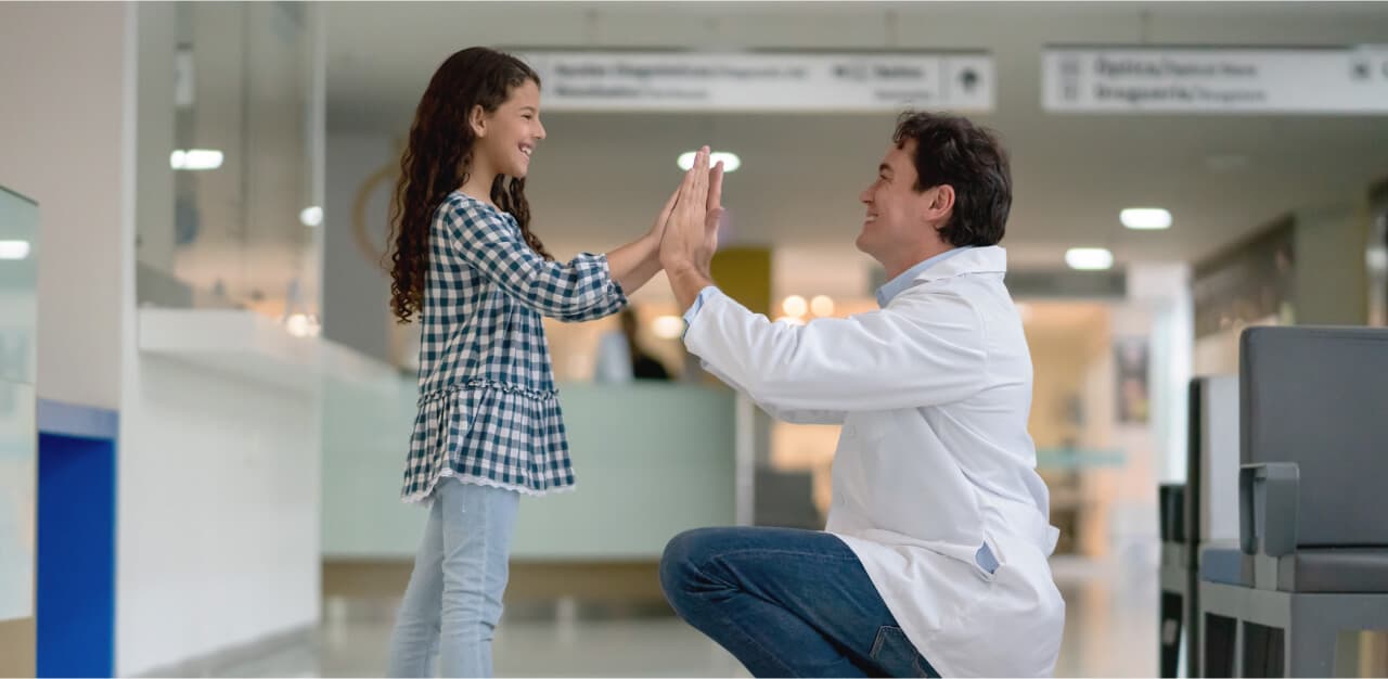 An RN helping a man.